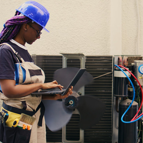 air conditioner being repaired
